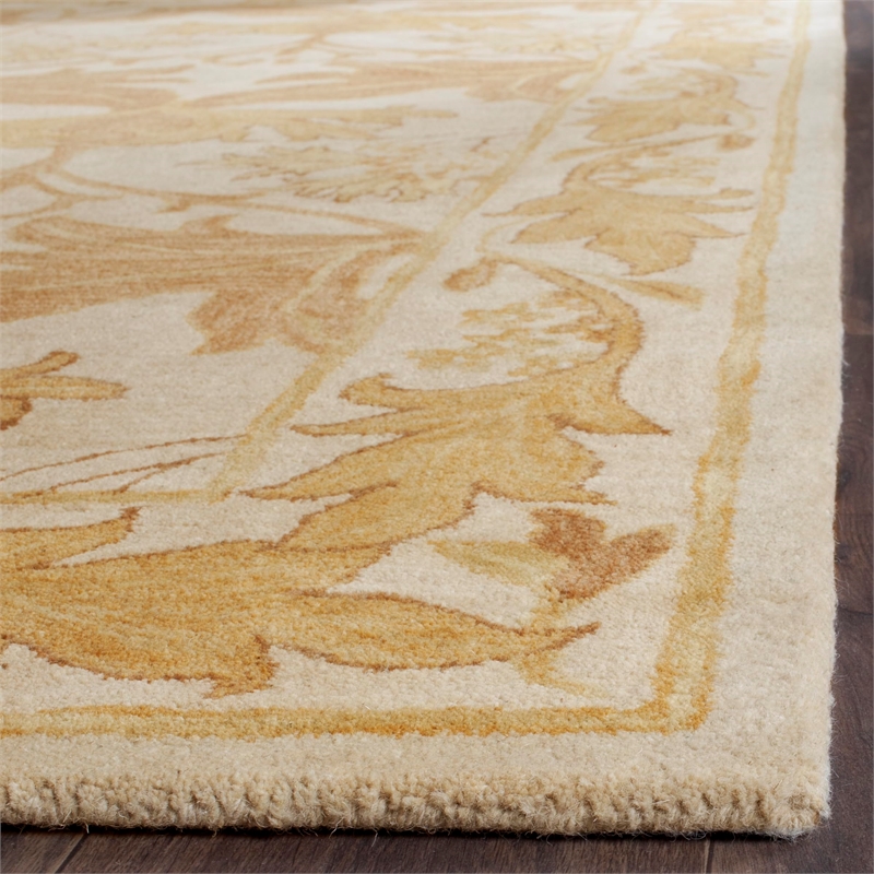 Safavieh Antiquity 6' X 9' Hand Tufted Wool Rug in Beige and Gold