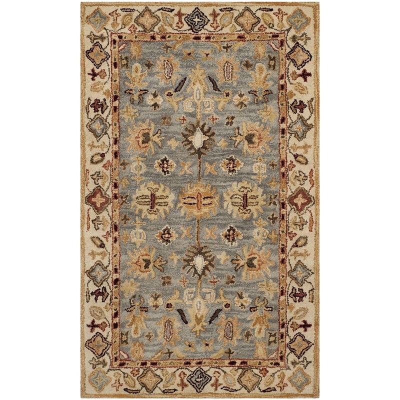 safavieh antiquity 4' x 6' hand tufted wool rug in blue and ivory