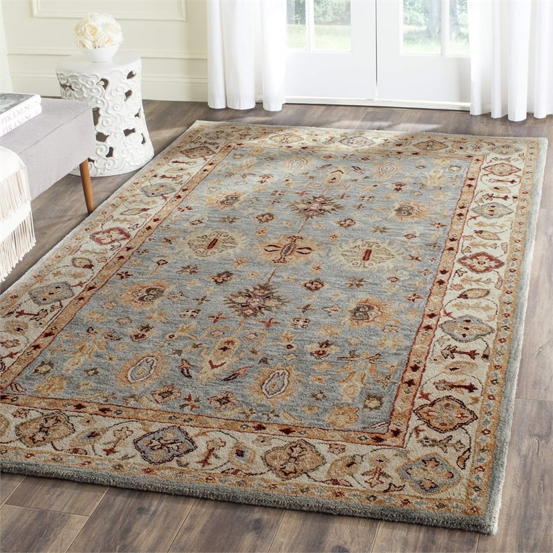 Safavieh Antiquity 5' X 8' Hand Tufted Wool Rug in Blue and Ivory