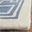 Safavieh Bella 4' X 6' Hand Tufted Wool Pile Rug in Blue and Ivory