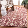 Safavieh Bella 6' X 9' Hand Tufted Wool Pile Rug in Rose and Taupe