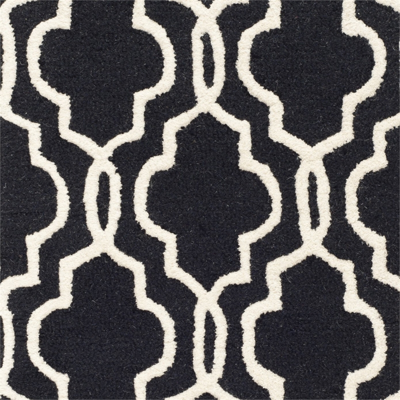safavieh cambridge 2'6&quot x 8' hand tufted wool rug in black and ivory