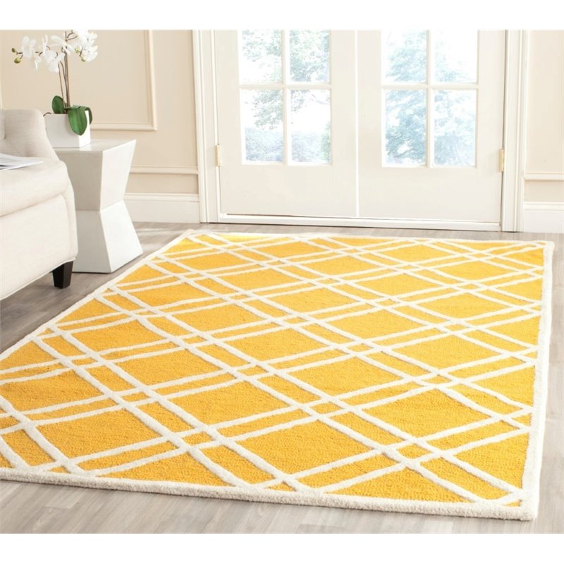 Safavieh Cambridge 5' X 8' Hand Tufted Wool Rug in Gold and Ivory