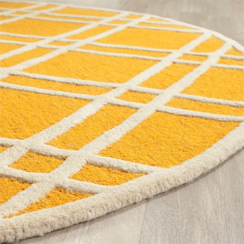 Safavieh Cambridge 9' X 12' Hand Tufted Wool Rug in Gold and Ivory