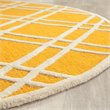 Safavieh Cambridge 9' X 12' Hand Tufted Wool Rug in Gold and Ivory