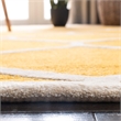 Safavieh Cambridge 5' X 8' Hand Tufted Wool Rug in Gold and Ivory