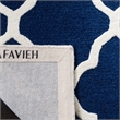 Safavieh Cambridge 9' X 12' Hand Tufted Wool Rug in Navy and Ivory