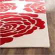 Safavieh Cambridge 6' Round Hand Tufted Wool Rug in Ivory and Red