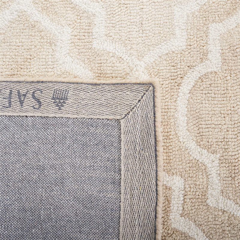 Safavieh Dip Dye 10' X 14' Hand Tufted Wool Rug in Beige and Ivory