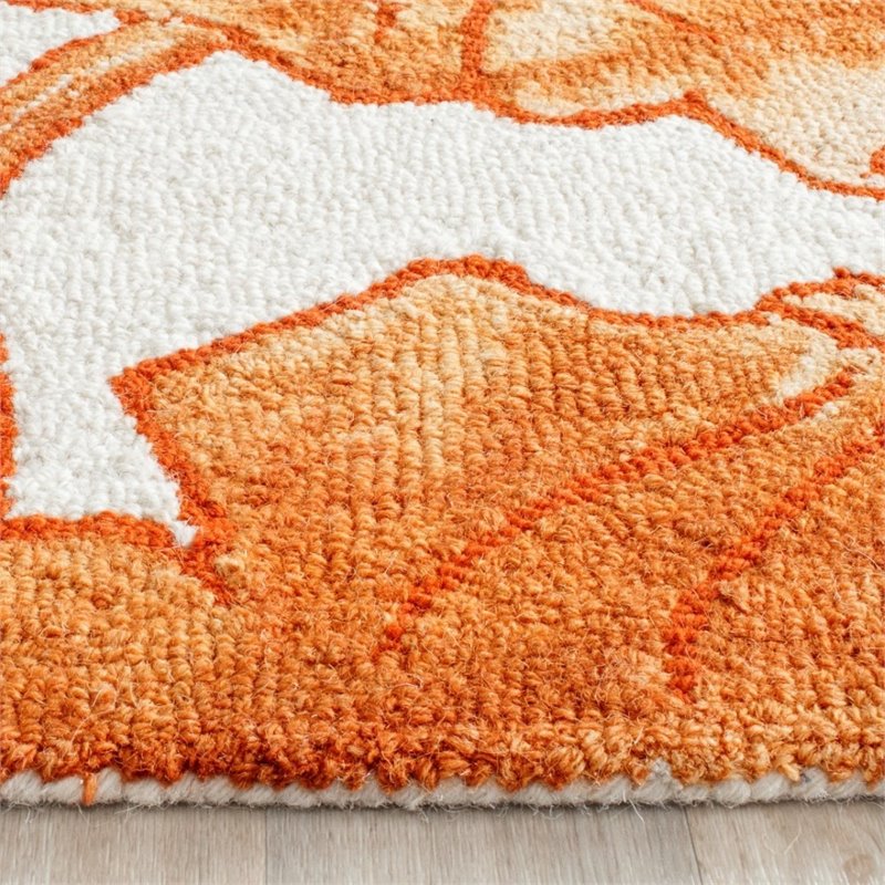 Safavieh Dip Dye 5' X 8' Hand Tufted Rug in Ivory and Orange
