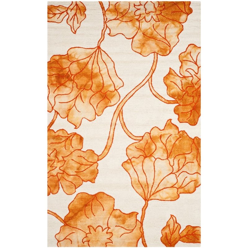 Safavieh Dip Dye 5' X 8' Hand Tufted Rug in Ivory and Orange