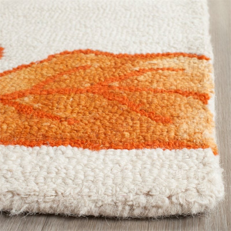 Safavieh Dip Dye 5' X 8' Hand Tufted Rug in Ivory and Orange