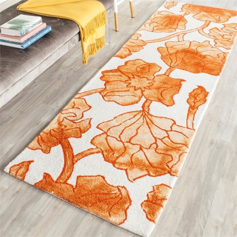 Safavieh Dip Dye 7' Round Hand Tufted Rug in Ivory and Orange