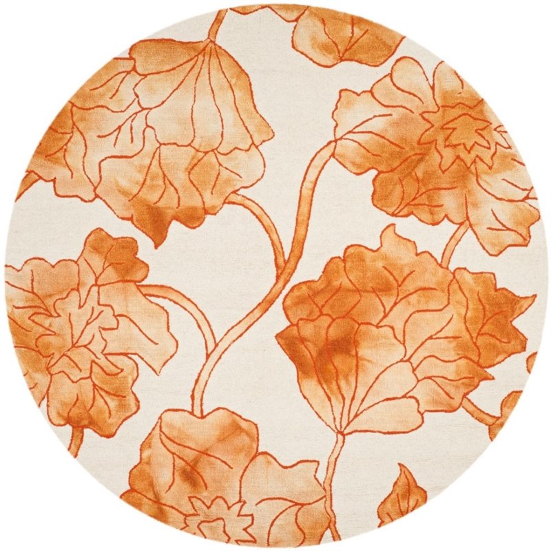 Safavieh Dip Dye 7' Round Hand Tufted Rug in Ivory and Orange