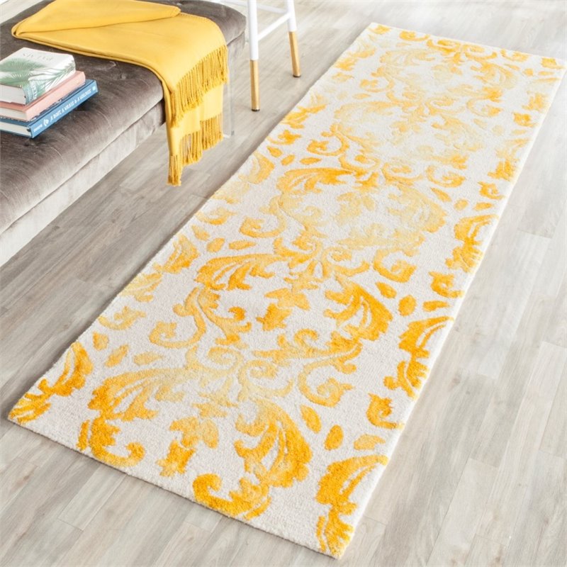 Safavieh Dip Dye 5' X 8' Hand Tufted Rug in Ivory and Gold