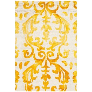 Safavieh Dip Dye 7' Square Hand Tufted Rug in Ivory and Gold