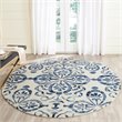 Safavieh Dip Dye 7' Round Hand Tufted Wool Rug in Ivory and Navy