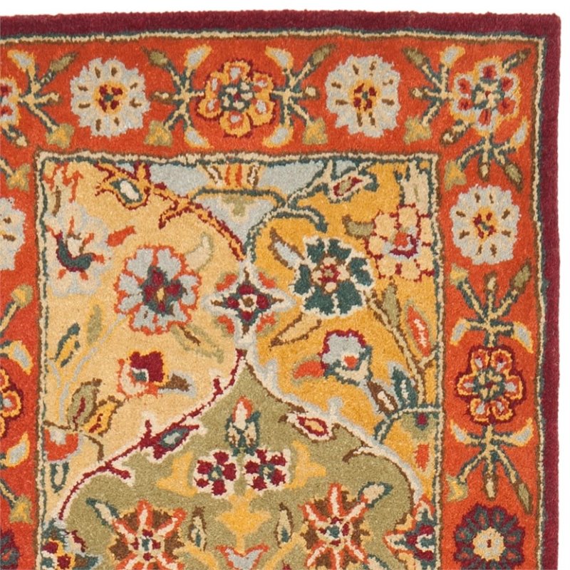 Safavieh Heritage 5' Round Hand Tufted Wool Pile Rug in and Red