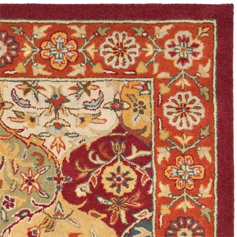 Safavieh Heritage 5' Round Hand Tufted Wool Pile Rug in and Red