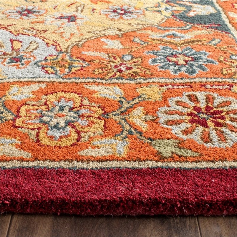 Safavieh Heritage 5' Round Hand Tufted Wool Pile Rug in and Red