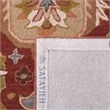 Safavieh Heritage 6' Round Hand Tufted Wool Pile Rug in Rust
