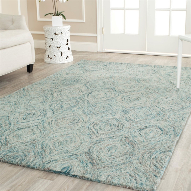 Safavieh Ikat 4' Round Hand Tufted Wool Rug in Ivory and Sea Blue
