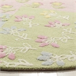 Safavieh 6' Round Hand Tufted Rug in Pink