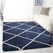 Safavieh Hudson Shag 6' X 9' Power Loomed Rug in Navy and Ivory
