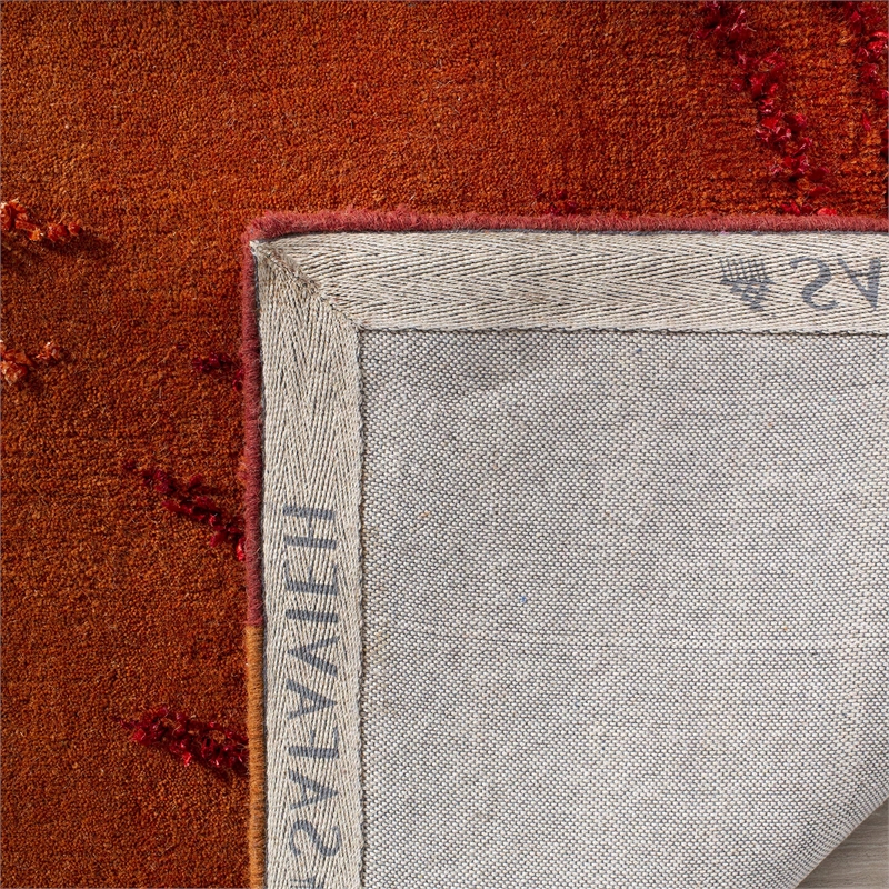 Safavieh Soho 6' X 9' Hand Tufted Wool Rug in Rust