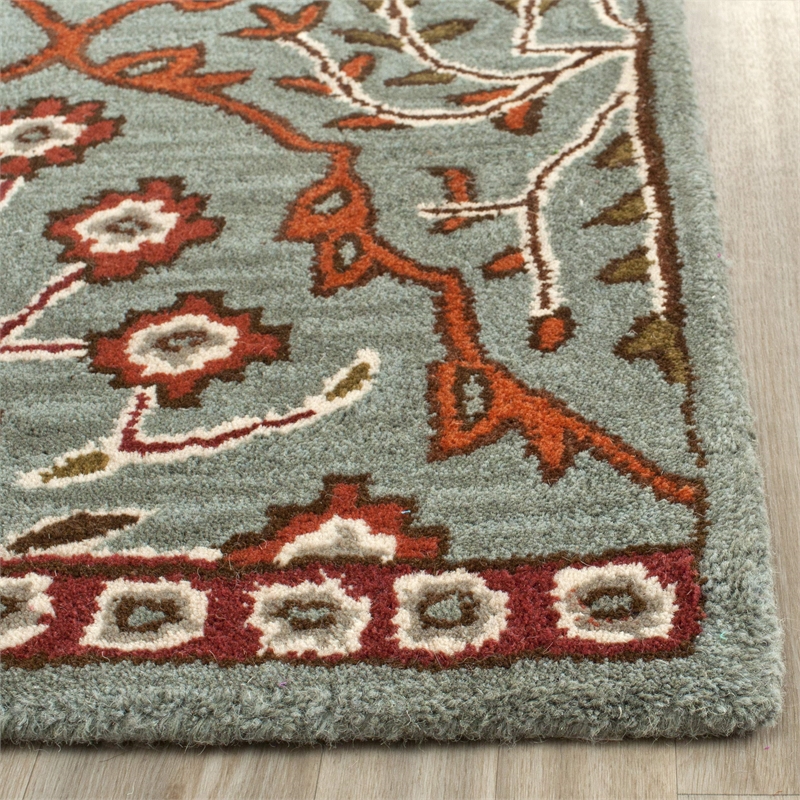 Safavieh Wyndham 6' X 9' Power Loomed Acrylic Rug in Blue and Rust