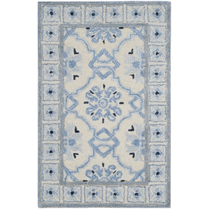 Safavieh Bella 6' X 9' Hand Tufted Rug in Ivory and Blue