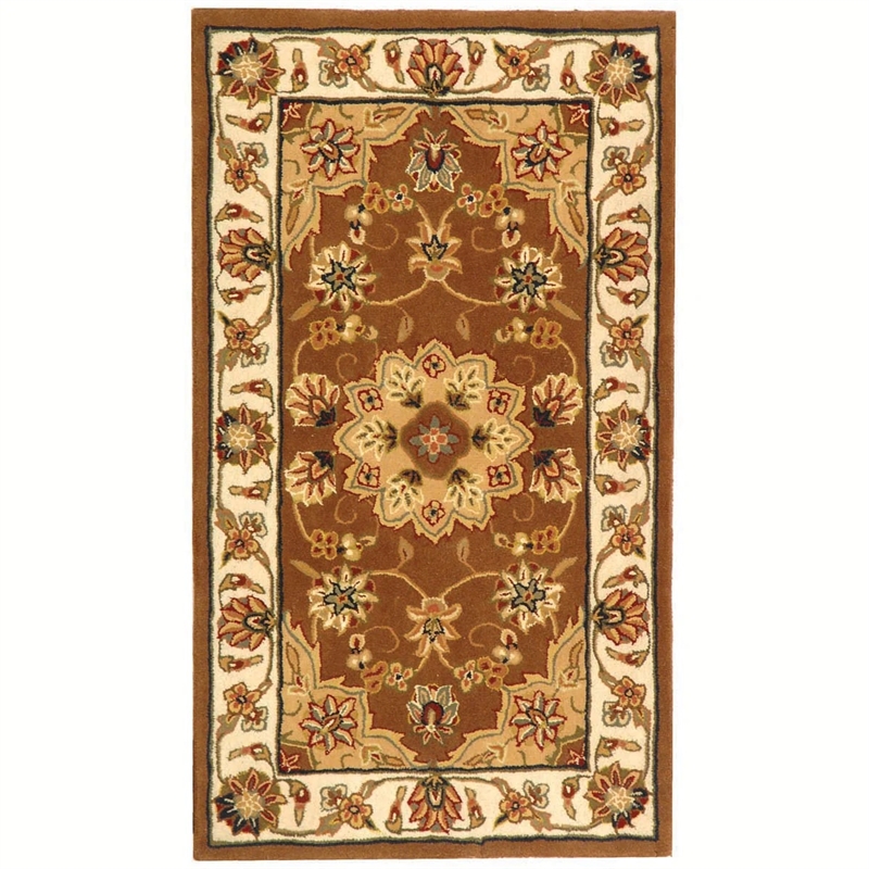 Safavieh Traditions 6' X 9' Hand Tufted Wool Rug in Tan and Ivory