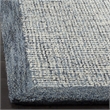 Safavieh Abstract 8' x 10' Hand Tufted Wool Rug in Navy and Ivory