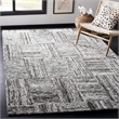 Safavieh Abstract 6' x 9' Hand Tufted Wool Rug in Ivory and Charcoal