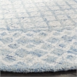 Safavieh Abstract 6' Round Hand Tufted Wool Rug in Blue and Ivory
