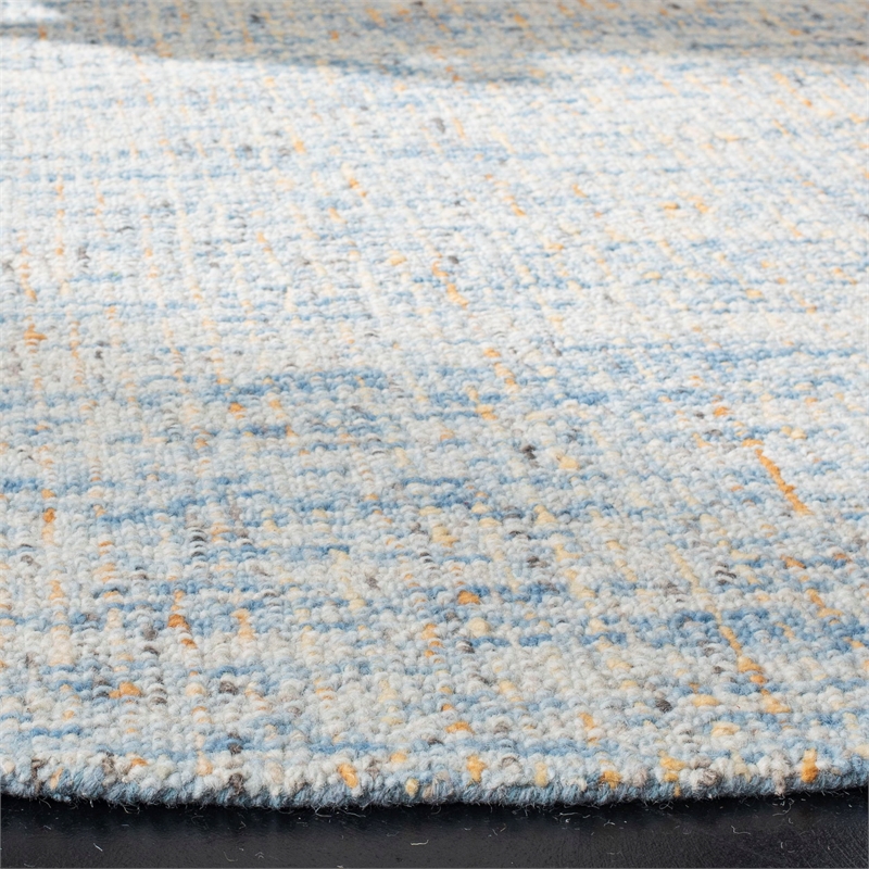 Safavieh Abstract 6' Round Hand Tufted Wool Rug in Dark Blue and Rust