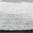 Safavieh Abstract 6' Round Hand Tufted Wool Rug in Dark Blue and Rust
