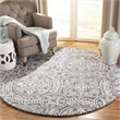 Safavieh Abstract 6' Round Hand Tufted Wool Rug in Gray and Ivory
