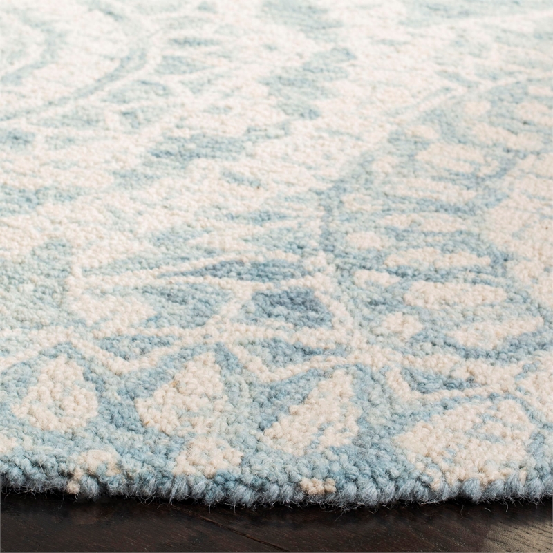 Safavieh Abstract 6' Round Hand Tufted Wool Rug in Ivory and Blue