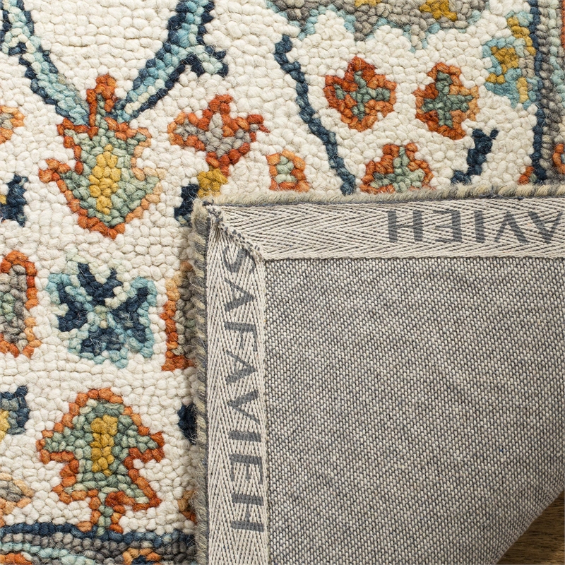 Safavieh Aspen 6' x 9' Hand Tufted Wool Rug in Ivory and Blue