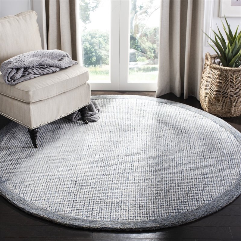 safavieh abstract 6' round hand tufted wool rug in navy and ivory