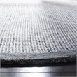 Safavieh Abstract 6' Round Hand Tufted Wool Rug in Navy and Ivory