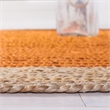 Safavieh Natural Fiber 9' Round Hand Woven Jute Rug in Orange
