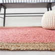 Safavieh Natural Fiber 7' Round Hand Woven Jute Rug in Pink