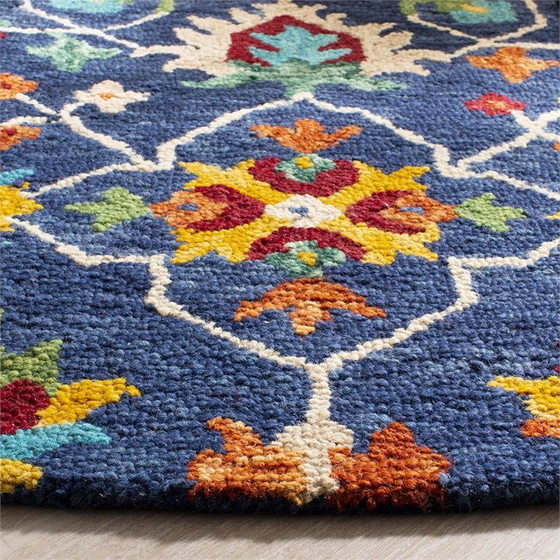 Safavieh Aspen 7' Round Hand Tufted Wool Rug in Navy and Red