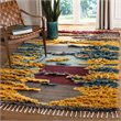 Safavieh Kenya 9' x 12' Hand Knotted Shag Wool Rug in Red and Gold