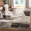 Safavieh Kenya 8' x 10' Hand Knotted Shag Wool Rug in Ivory