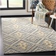Safavieh Kenya 5' x 8' Hand Knotted Shag Wool Rug in Gray and Gold