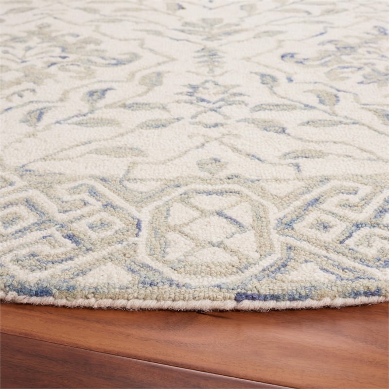 Safavieh Dip Dye 7' Round Hand Tufted Wool Rug in Light Blue and Ivory