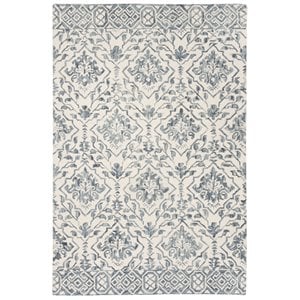 safavieh dip dye 4' x 6' hand tufted wool rug in blue and ivory